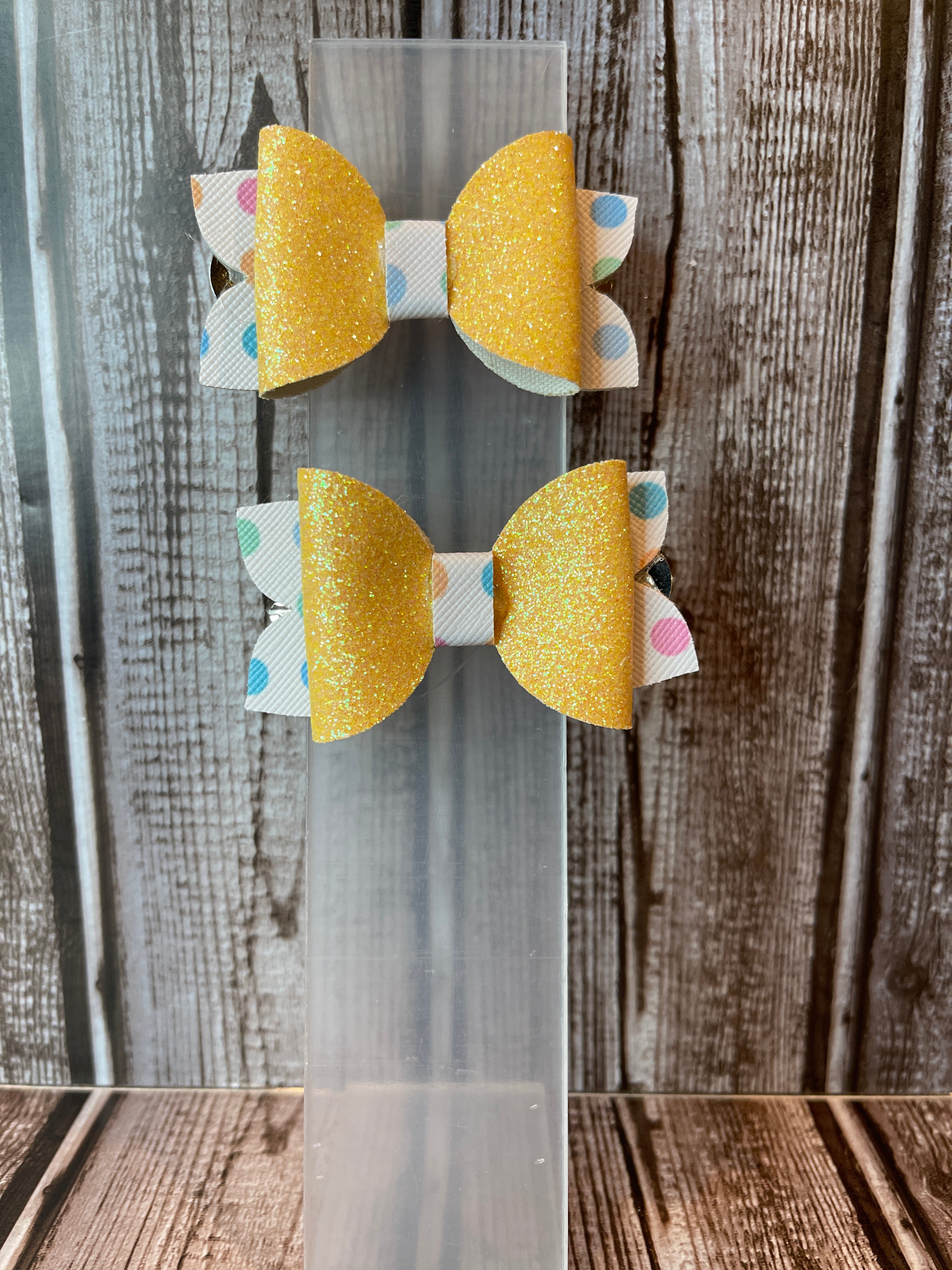 Yellow glitter with poke a dot faux leather hair bows