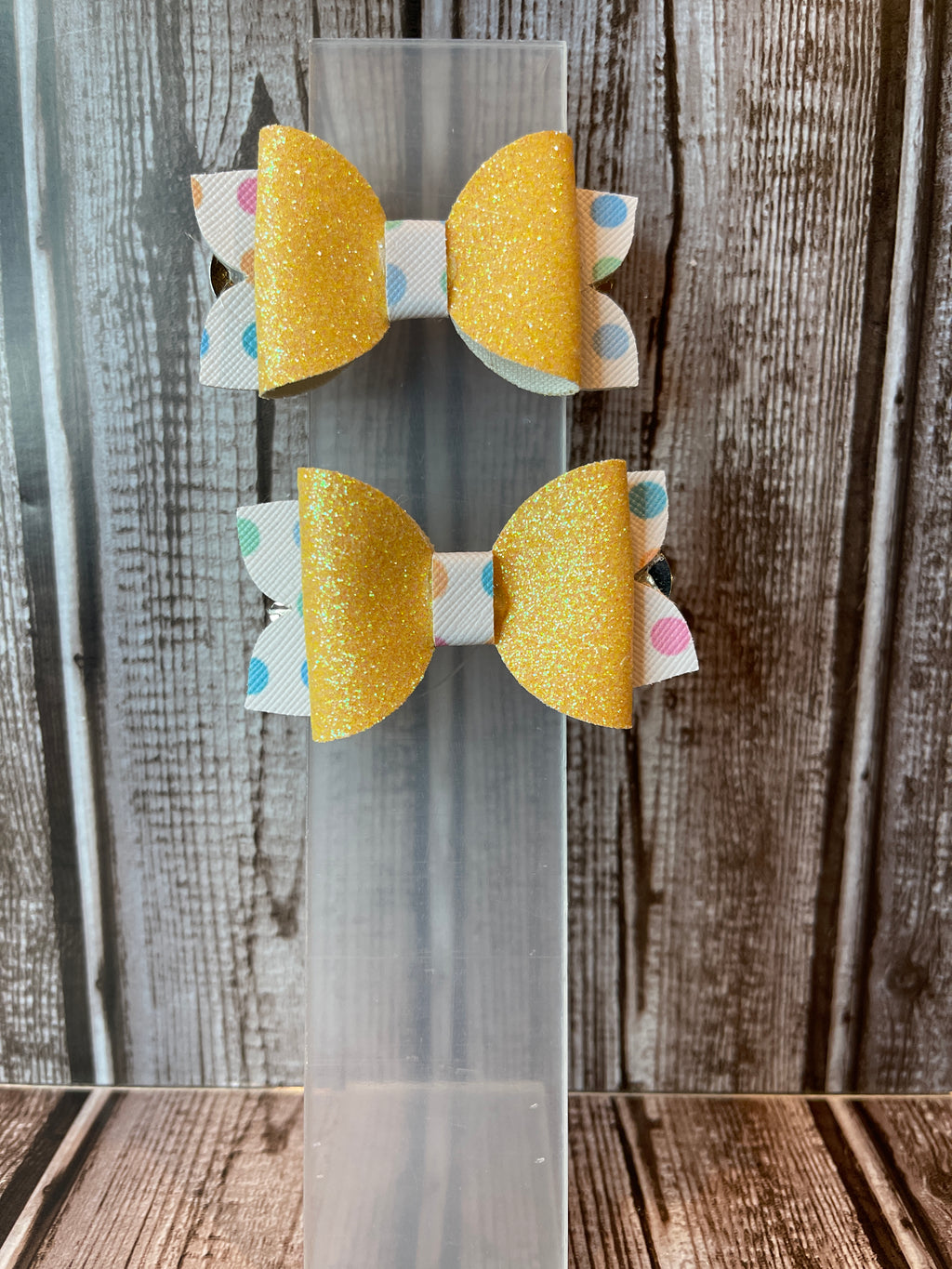 Yellow glitter with poke a dot faux leather hair bows