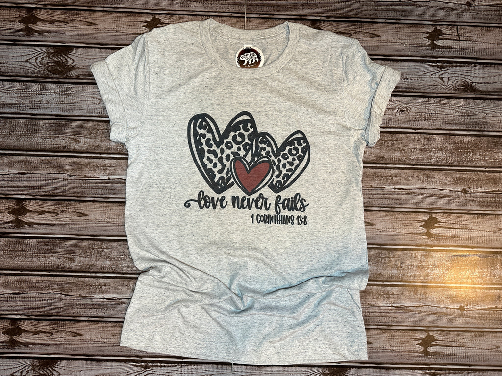 Love Never Fails Tee